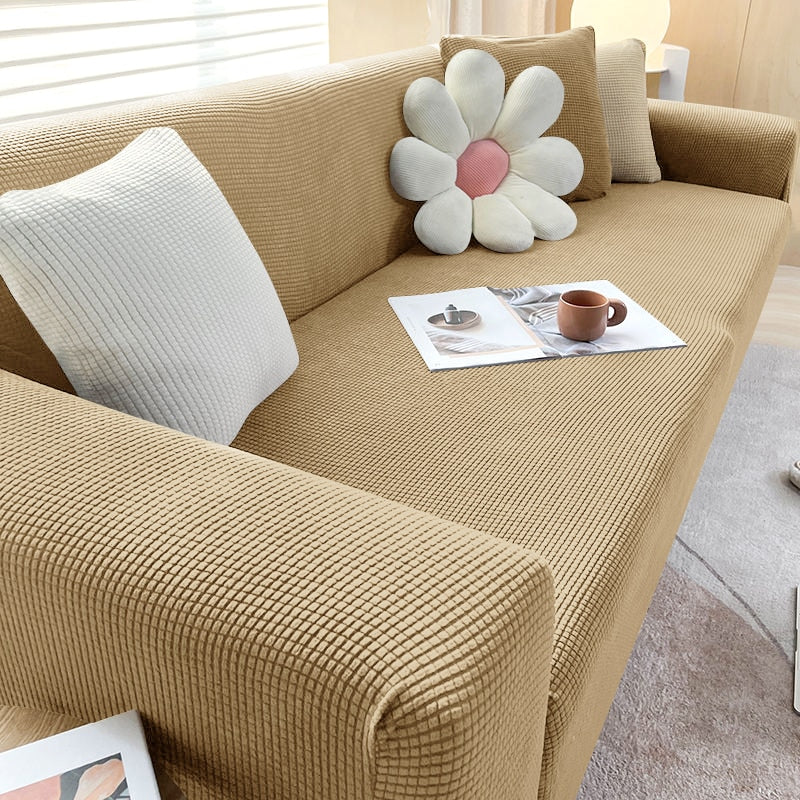 "Rekbare bankhoes met strakke pasvorm, elastisch materiaal in stijlvol design, beschermt tegen vlekken en huisdierharen."