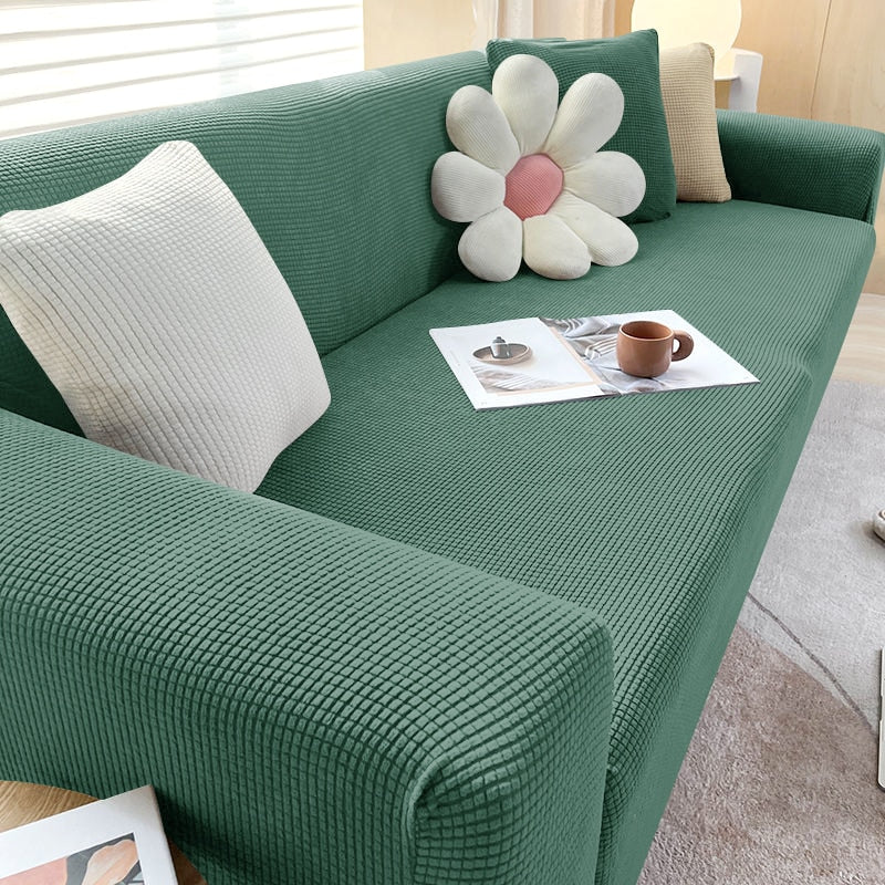 "Rekbare bankhoes met strakke pasvorm, elastisch materiaal in stijlvol design, beschermt tegen vlekken en huisdierharen."