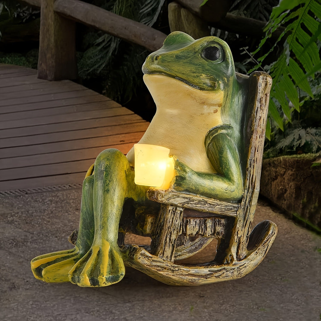 Sfeervol solar tuinbeeld: een relaxte kikker met geïntegreerde LED verlichting voor buiten.