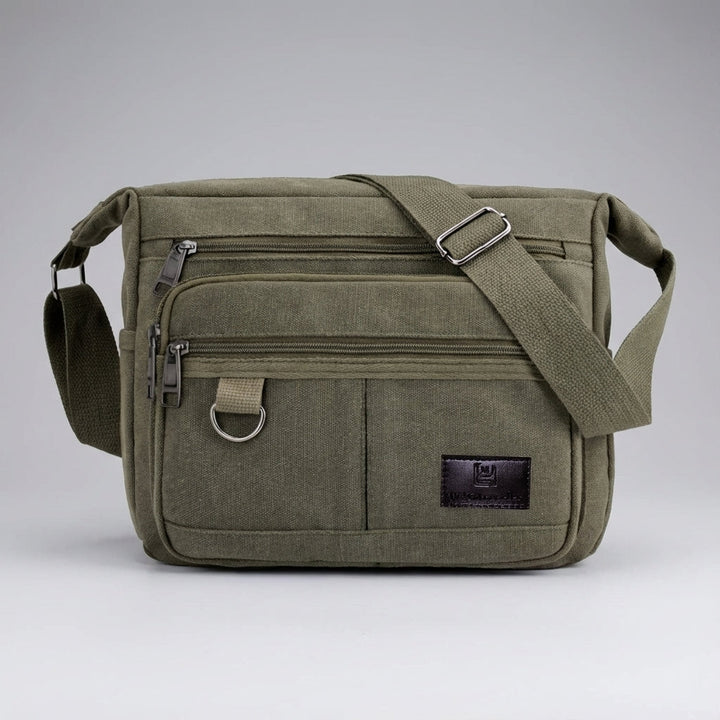 Zwarte RFID blokkerende messenger tas, perfect voor documenten en waardevolle spullen op reis.