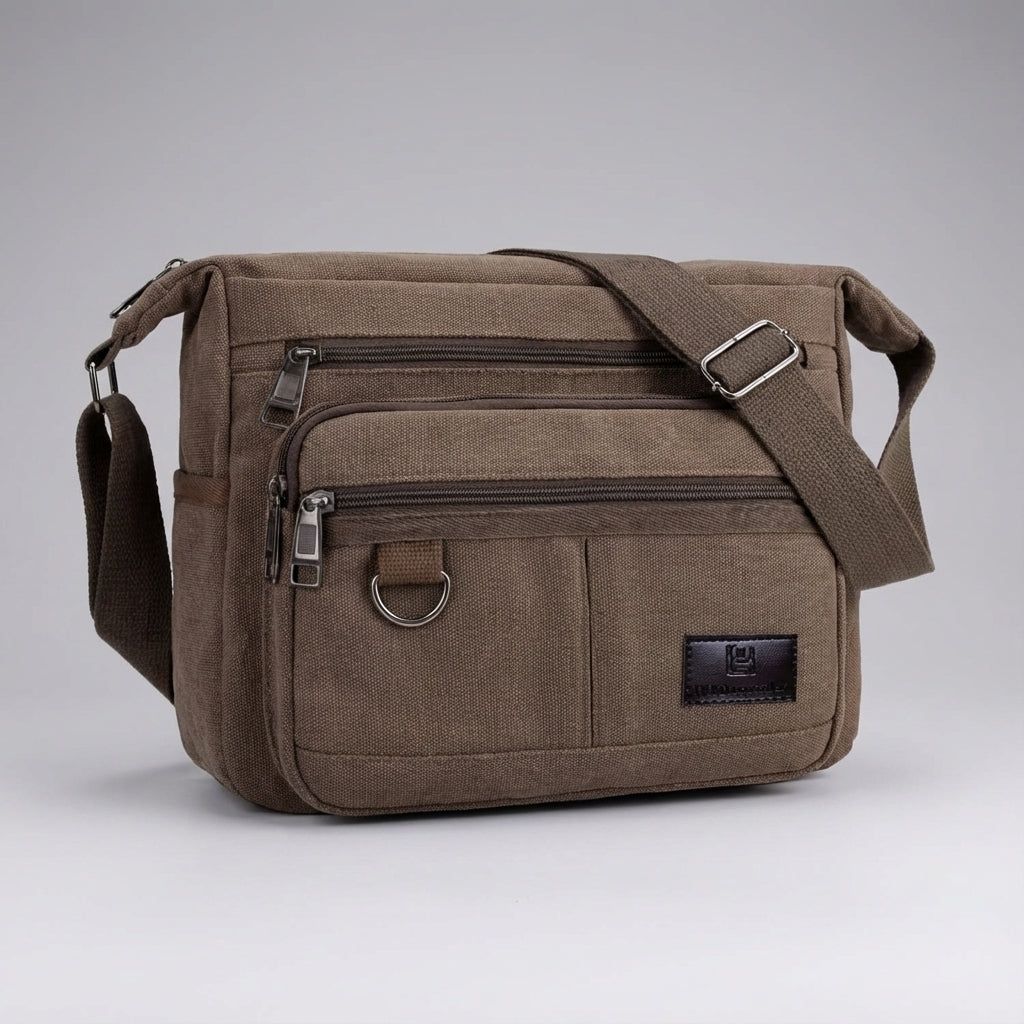 Detail van voorvak van RFID messenger tas, toont rits en stevige canvas stof.