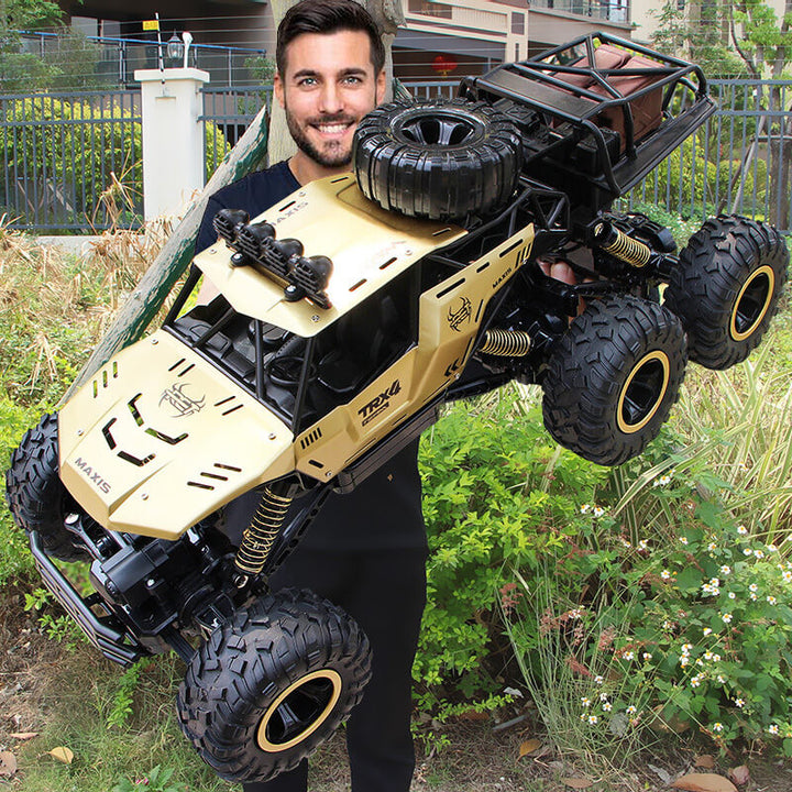 Robuuste 6-wiel RC monster truck schaal 1:12. Off-road radiografisch voertuig voor snel speelplezier.