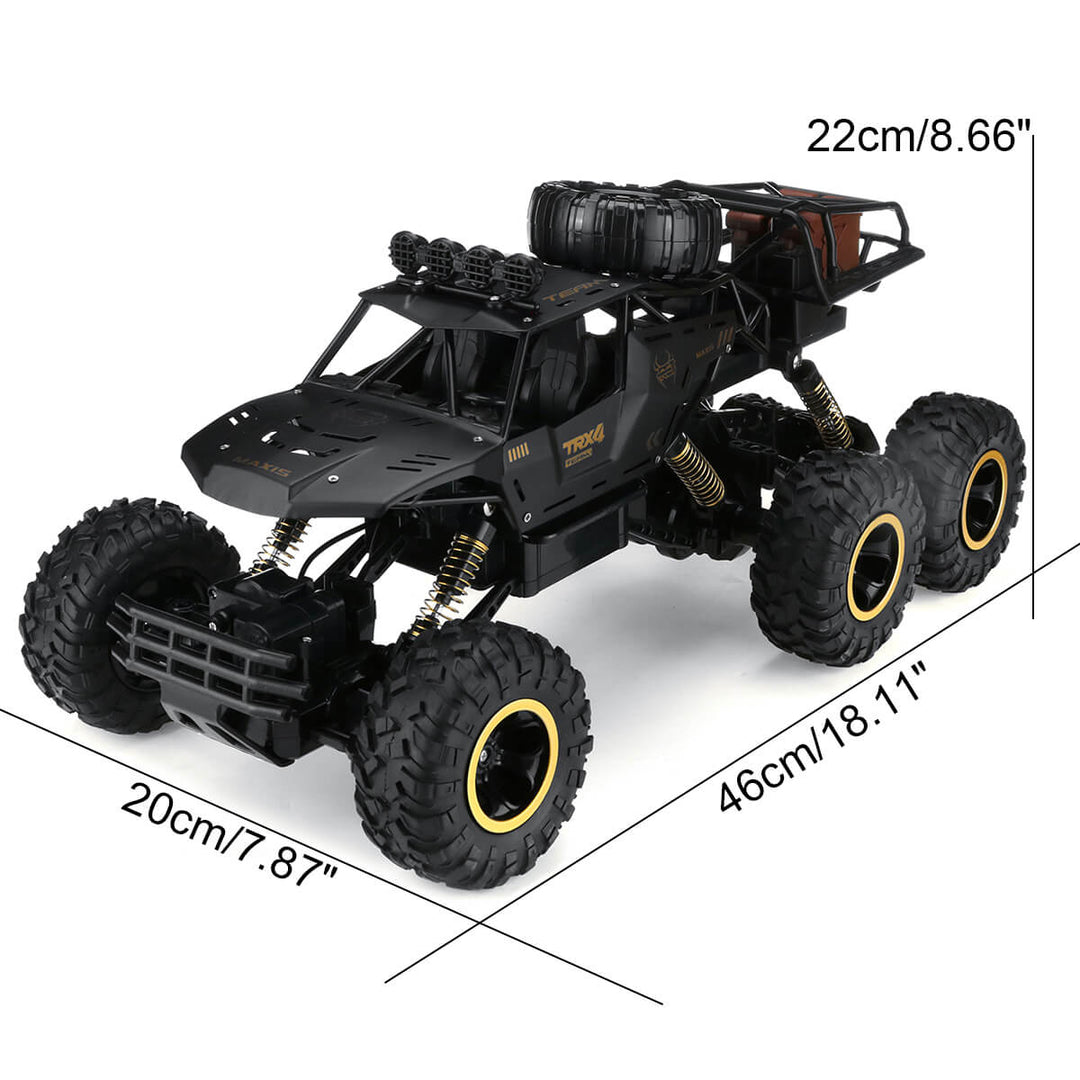 Twee 6-wiel RC monster trucks racen off-road. 2.4GHz technologie voor multiplayer fun.