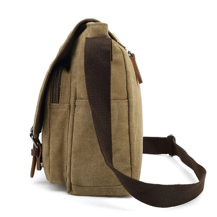 Betrouwbare reistas voor mannen, duurzame canvas crossbody tas. Houdt persoonlijke spullen veilig en georganiseerd.