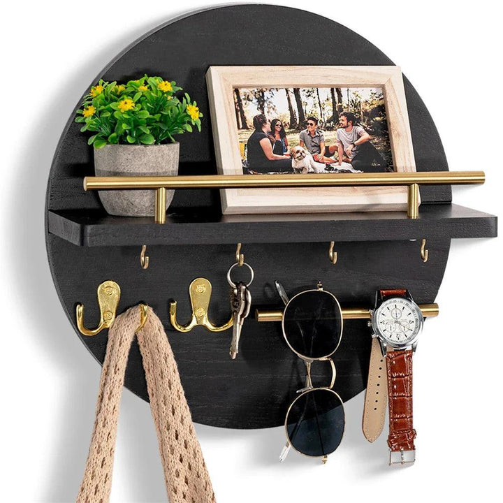 Organiseer sleutels stijlvol met deze ronde houten sleutelhouder, essentieel voor een opgeruimde hal.