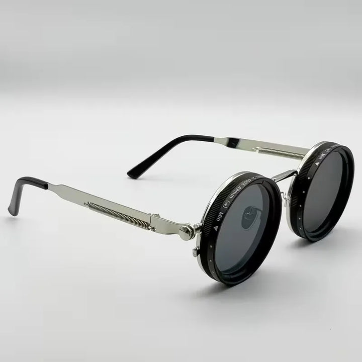 Stijlvolle ronde steampunk zonnebril met duurzame vintage details, perfect unisex.