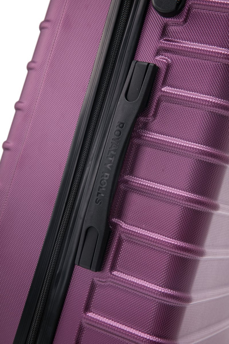 Manoeuvreerbare roze reiskoffer set met 4 soepele wielen, perfect voor stressvrij reizen.