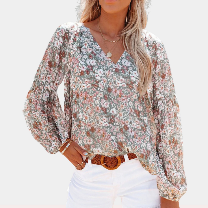 "Roze bloemenblouse met V-hals en lange mouwen, vrouwelijke look voor lente- en zomerdagen."