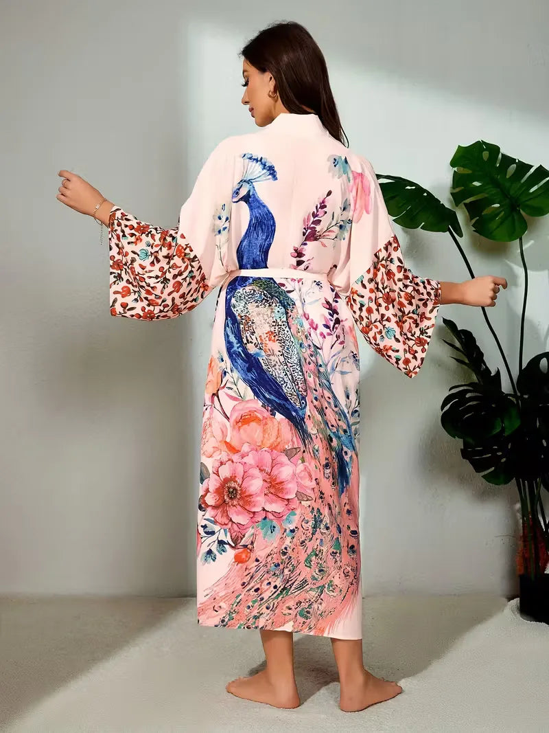 Luchtige roze bohemian cover-up dames met lange mouwen en bloemenprint, perfect voor de zon.