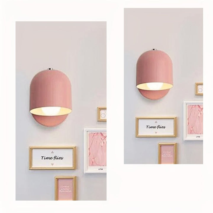 Minimalistische Scandinavische wandlamp. Kleurrijk metaal en sfeervolle verlichting voor een eigentijds interieur.