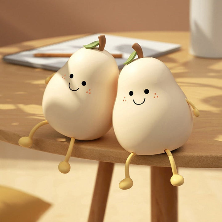 "Schattig siliconen nachtlampje in peervorm, dimbaar en sfeervol, perfect voor kinderkamers en nachtelijke veiligheid."