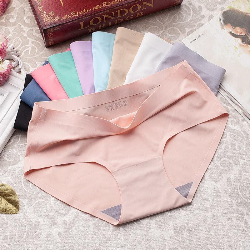"Set van 5 zijdezachte naadloze damesslips in zwart, wit, beige, paars en roze, perfect voor ultiem comfort."
