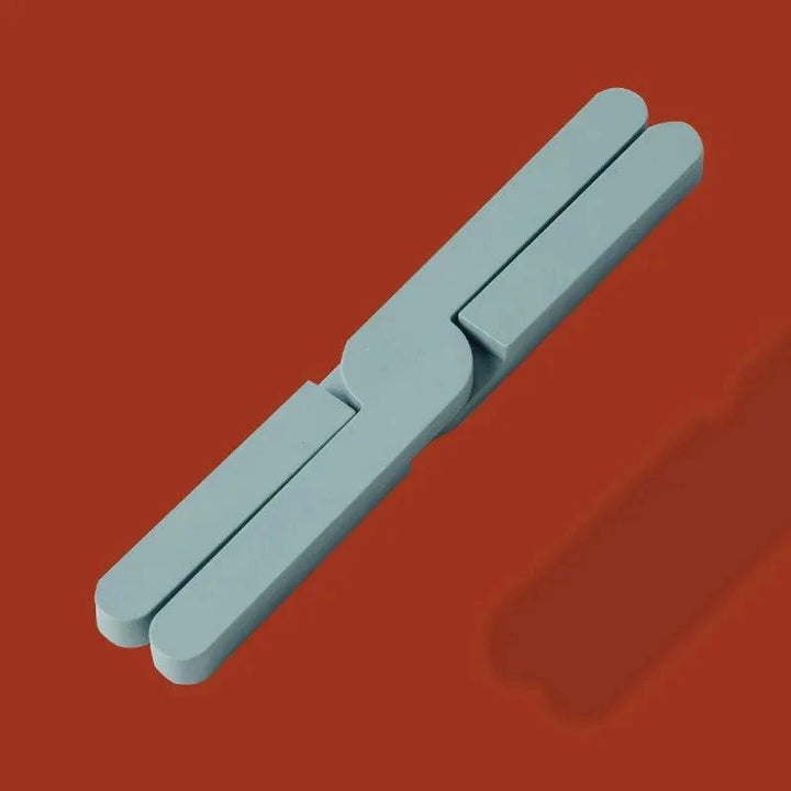 "Siliconen warmtebestendige pad, vouwbaar en antislip, beschermt tafels tegen hitte, compact en duurzaam, blauwe kleur."