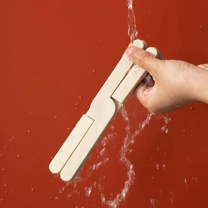 "Siliconen warmtebestendige pad, vouwbaar en antislip, beschermt tafels tegen hitte, compact en duurzaam, blauwe kleur."