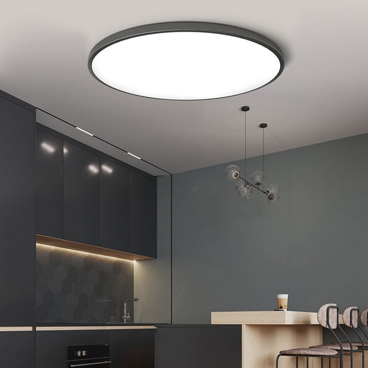 Slanke platte LED plafondlamp met modern design, energiezuinig wit of zwart, geschikt voor elke ruimte.