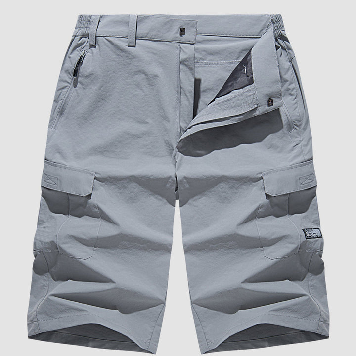 "Sneldrogende heren cargo shorts, lichtgewicht en beige, met praktische zakken en comfortabele pasvorm voor outdoor avonturen