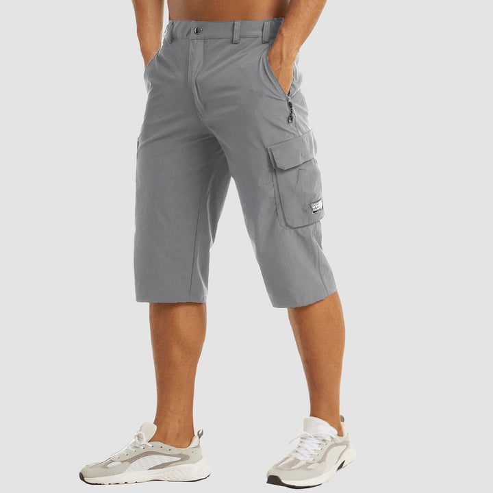 "Sneldrogende heren cargo shorts, lichtgewicht en beige, met praktische zakken en comfortabele pasvorm voor outdoor avonturen