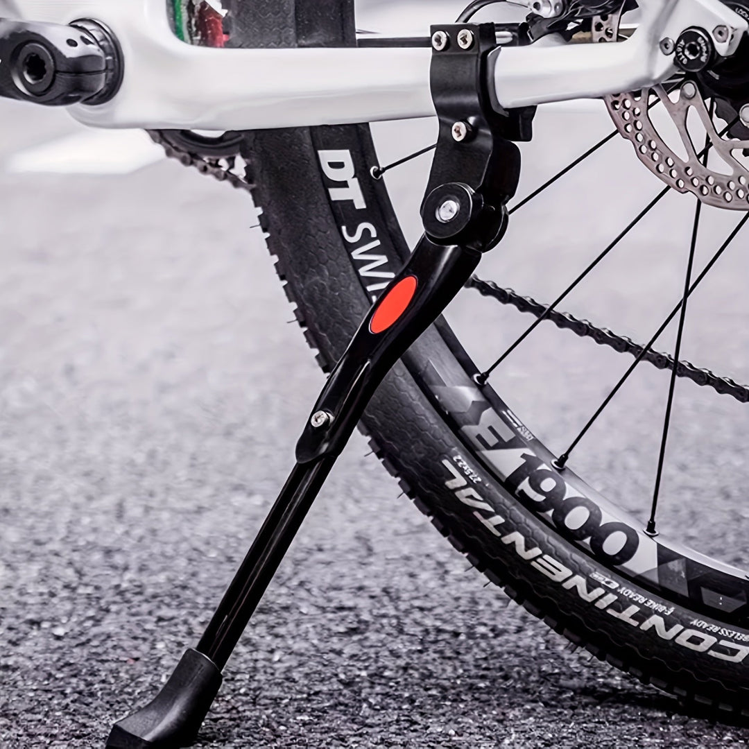 "Stevige, verstelbare fietsstandaard van aluminium en kunststof met zijkickstand voor stabiel parkeren op diverse fietsen."