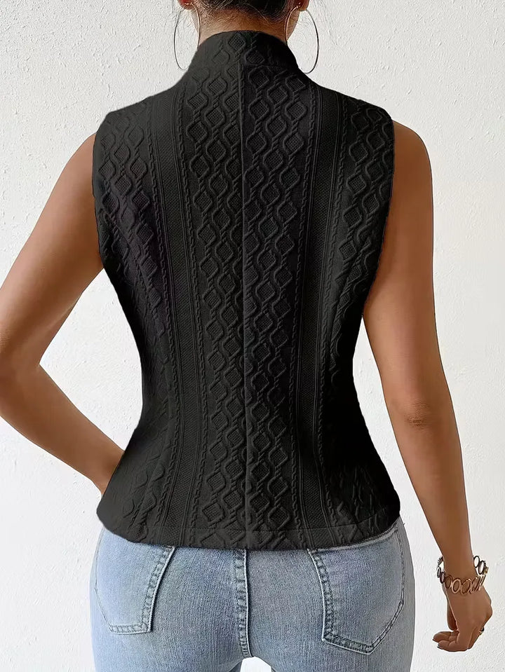 Warm slim fit dames gilet voor herfst/winter, elegant mouwloos model met V-hals en knopen.