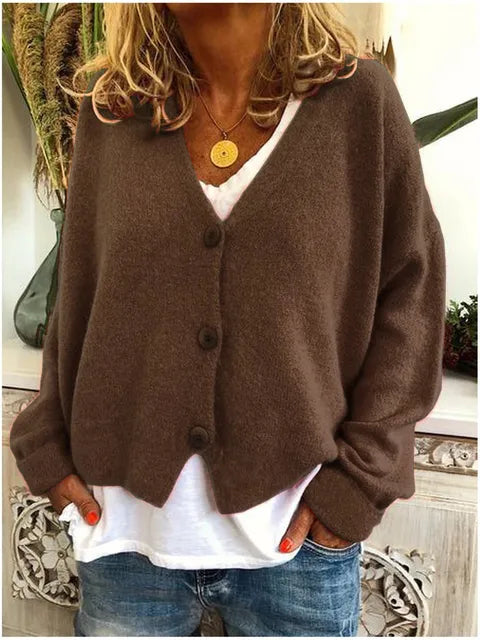 Elegant dames knopen vest met diepe V-hals en lange mouwen. Perfect als lente- of herfstvest, casual en comfortabel.