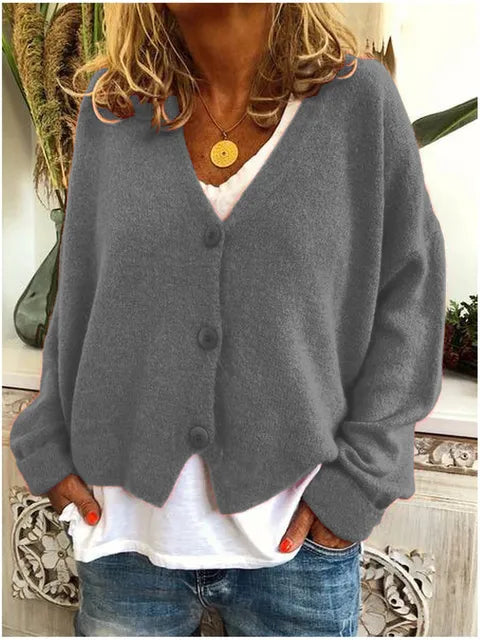 Comfortabel dames vest met lange mouwen, V-hals en knopen. Perfect stijlvol knopen vest voor casual outfits in de lente/herfst.