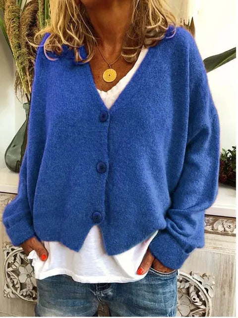 Chic dames v-hals vest met knopen, perfect voor een stijlvolle casual look. Ideaal als lente/herfst vest met lange mouwen.