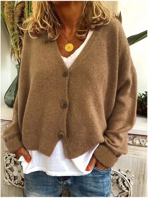 Dames knopen vest met V-hals en lange mouwen, een veelzijdig en comfortabel kledingstuk voor de lente en herfst.