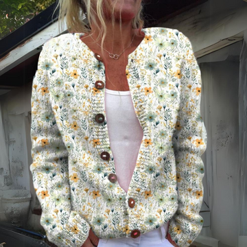 Stijlvol damesvest met kleurrijke bloemenprint, gebreid voor optimale warmte en comfort tijdens koude dagen.
