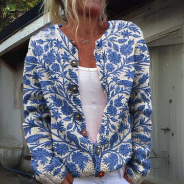 Stijlvol damesvest met kleurrijke bloemenprint, gebreid voor optimale warmte en comfort tijdens koude dagen.
