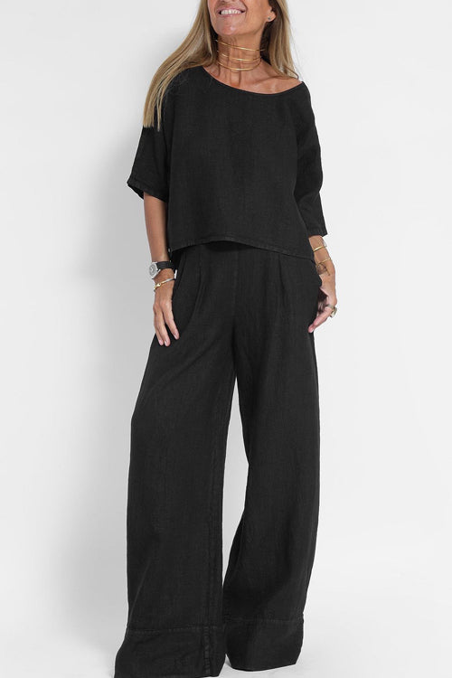 "Stijlvol katoen-linnen damespak, cropped top en wijde broek, licht ademend, ideaal voor zomer, modieus en comfortabel."