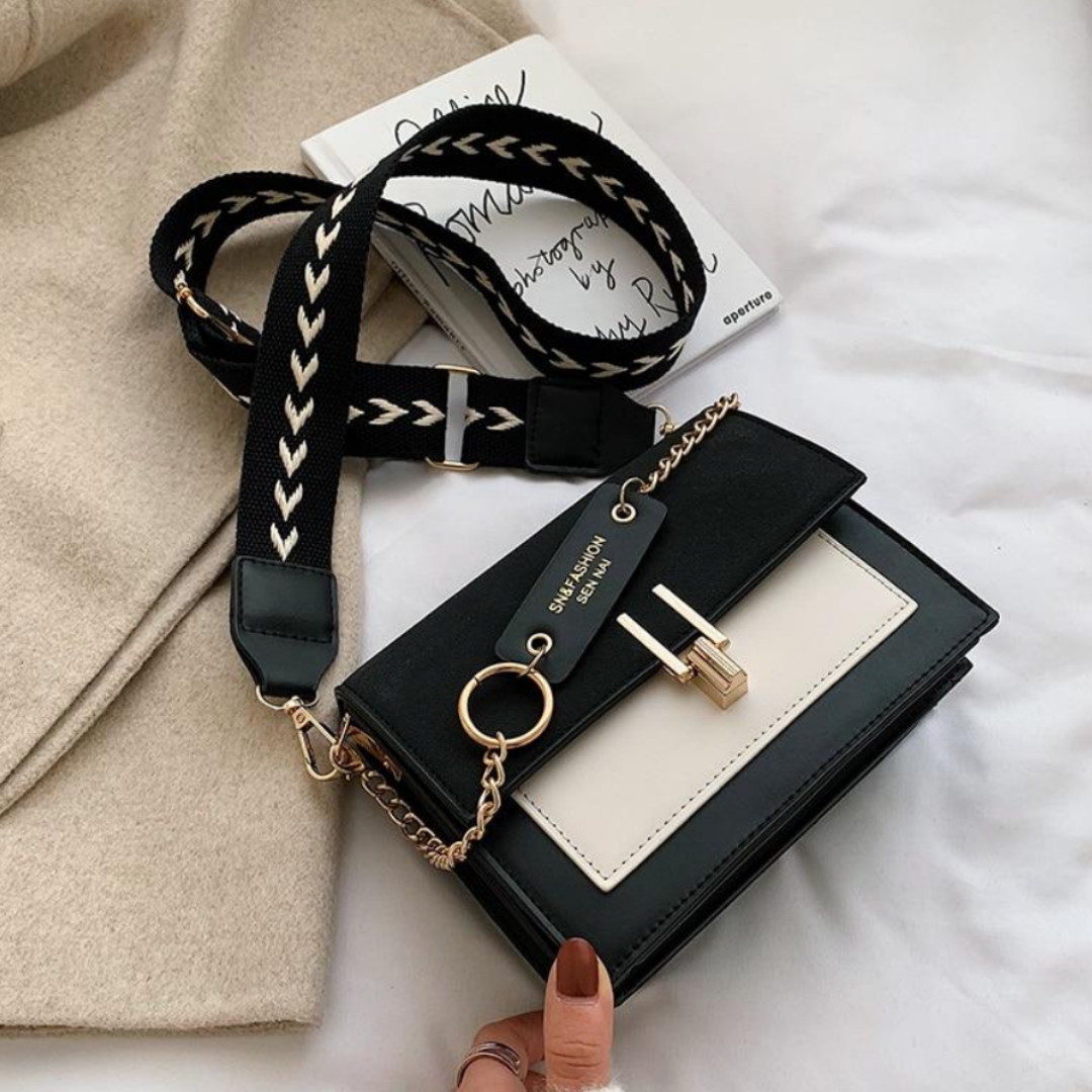 Stijlvol Sana dames schoudertasje van kunstleer, perfect als compacte crossbody tas voor de zomer.