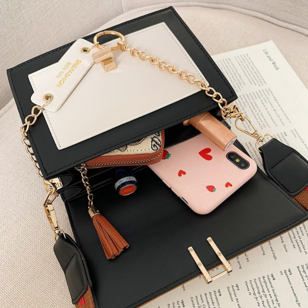 Compact Sana dames handtasje over de schouder, een veelzijdige en elegante accessoire voor elke dag.
