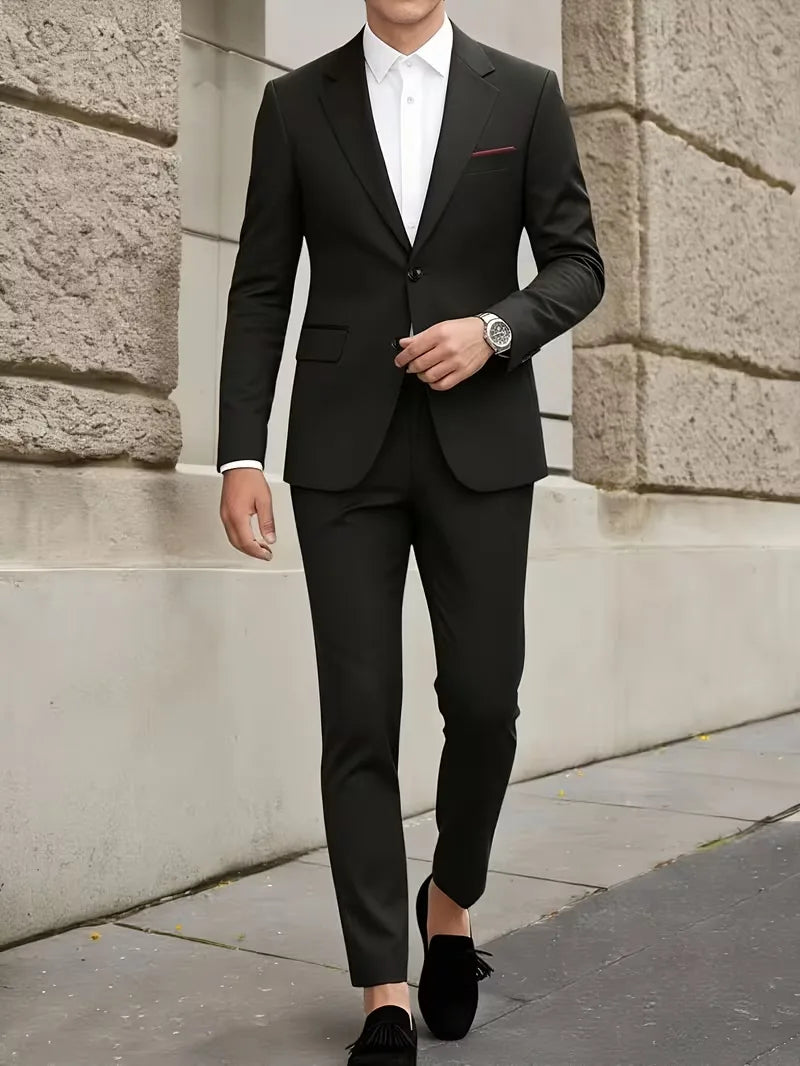 Modern zwart slim fit heren kostuum, perfect voor een chique avond of een bruiloftsfeest.