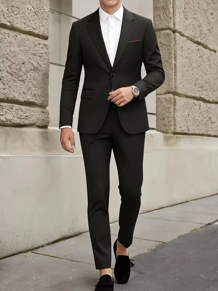 Modern zwart slim fit heren kostuum, perfect voor een chique avond of een bruiloftsfeest.