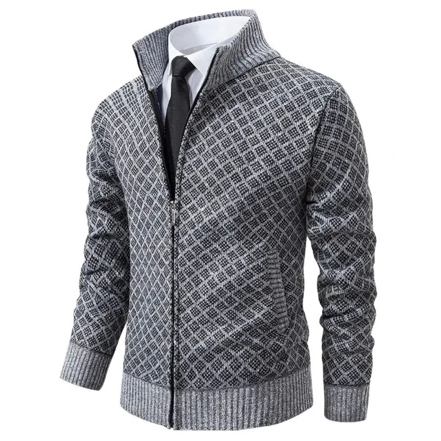 Detail van het hoogwaardige herenvest, met aandacht voor de stof en elegante afwerking.