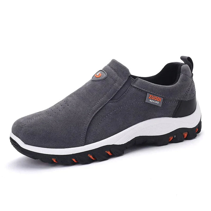 "Stijlvolle, ademende heren slip-on sneakers zonder veters, grijs met orthopedische zool voor ultiem comfort en gemak."