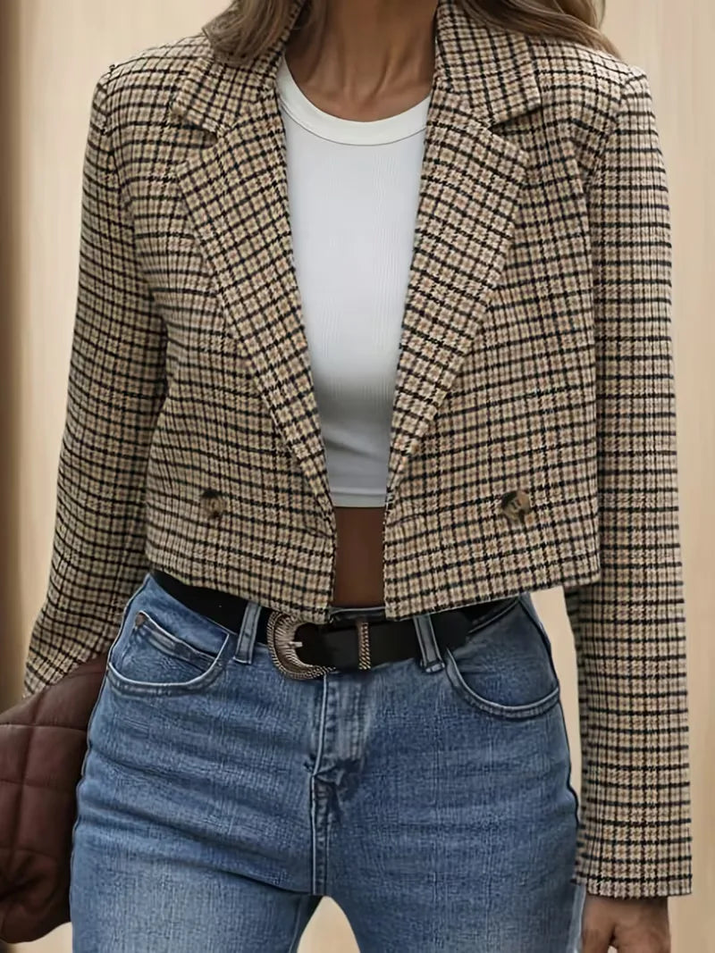 Stijlvolle dames blazer met geruit patroon en lange mouwen. Perfect voor smart casual, kantoor, lente of herfst.