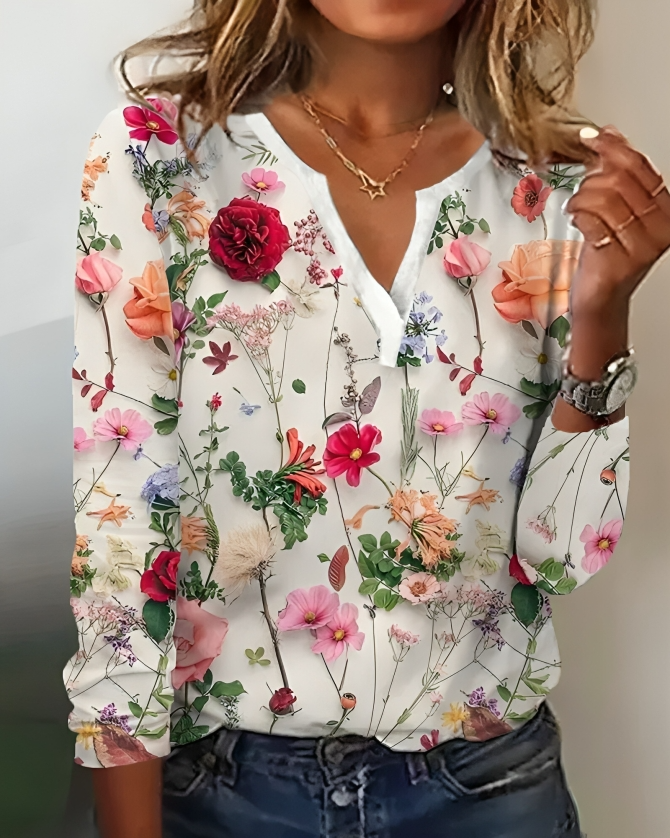 "Stijlvolle dames bloemenblouse met V-hals, levendig patroon, comfort en veelzijdig geschikt voor elke gelegenheid."