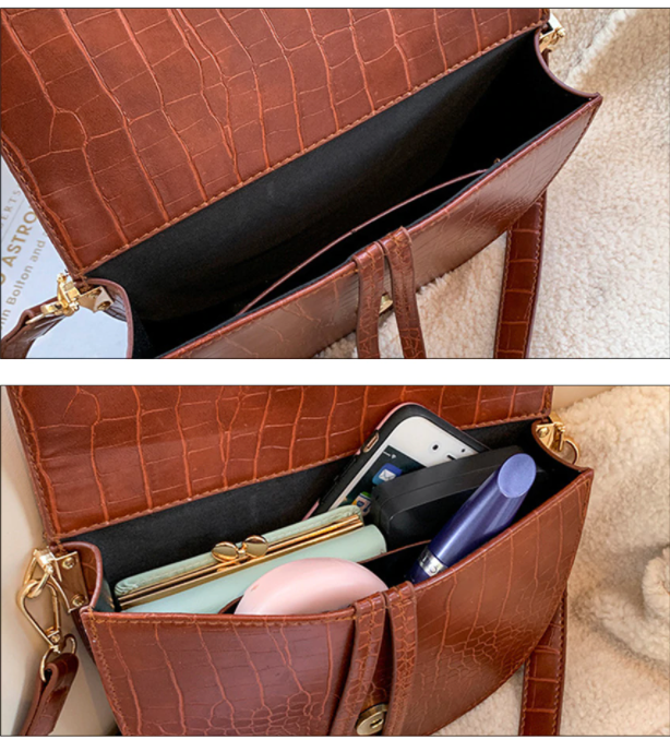 Vrouwelijke mode-accessoire: dames crossbody tas met stoere krokodillenprint, elegant en stijlvol.
