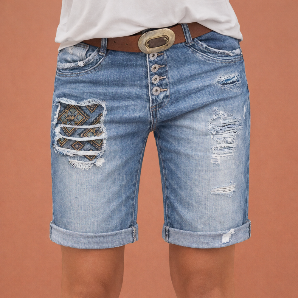 Modieuze en comfortabele dames ripped denim shorts, ideaal voor zomerse dagen en casual outfits.