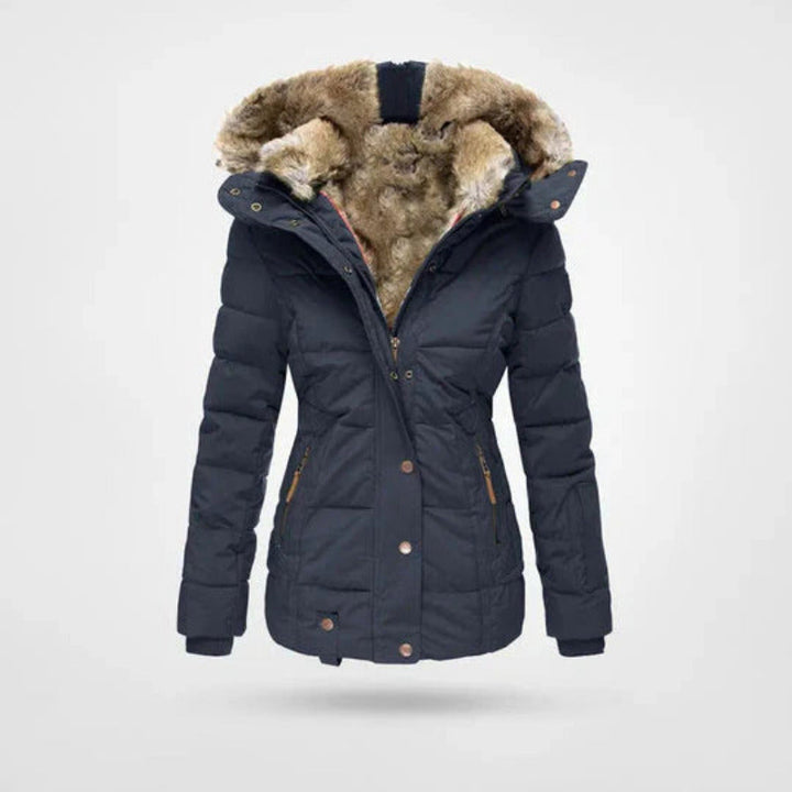 Comfortabele gewatteerde dames winterjas met gevoerde capuchon, ideaal voor koude winterdagen.