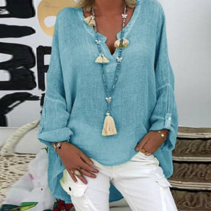 Veelzijdige damesblouse, geschikt voor zowel casual als elegante outfits. Perfecte lente/zomer mode.