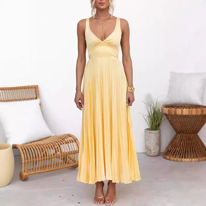 Elegante gele plissé maxi jurk voor dames; dé perfecte zomer- of feestjurk met comfortabele pasvorm.
