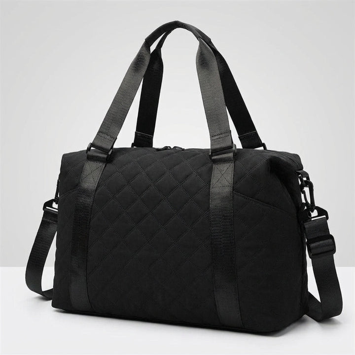Comfortabele en stijlvolle gewatteerde unisex weekendtas van Quiltiva, perfect voor elk reisavontuur.
