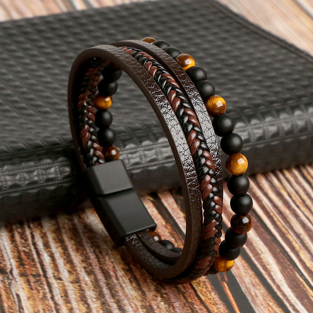Stijlvolle heren armband set met zwarte, bruine en blauwe kralen. Veelzijdig sieraad voor een moderne look.