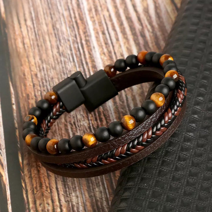 Veelzijdige heren armband set, perfect voor dagelijks gebruik en combineerbaar. Zwart, bruin, blauw herenmode sieraad.