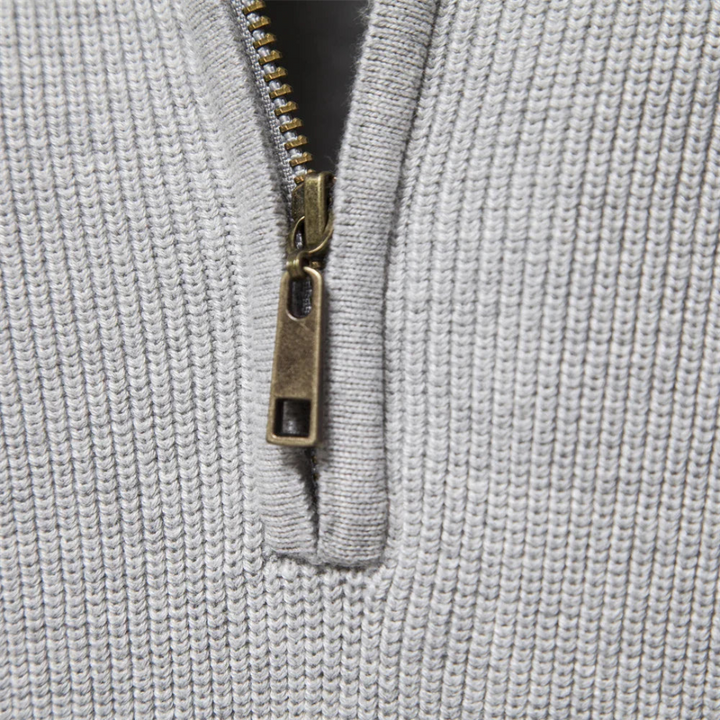 Trendy heren half-zip trui, perfect voor een stijlvolle herfst- en winteroutfit met ribgebreide details.