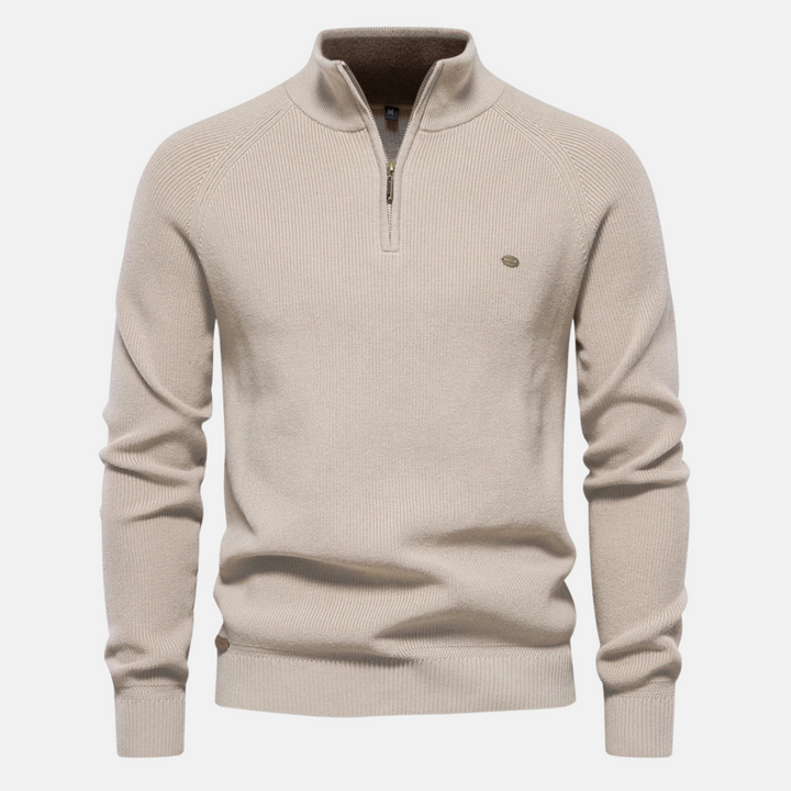 Gedetailleerde weergave van de half-zip heren trui met nadruk op de elegante ribgebreide mouwen.