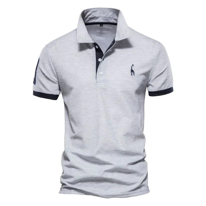 "Stijlvolle heren polo, comfortabel en veelzijdig, in blauw, geschikt voor casual en geklede gelegenheden, polyester stof."