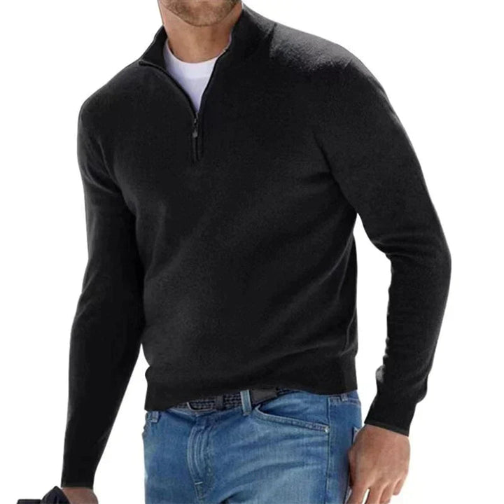 Heren trui met halve rits en lange mouwen. Deze comfortabele pullover is ideaal voor herfst- en winterdagen.
